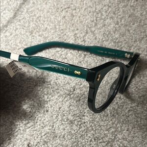 Gucci Teal Round Eyewear KERING GG12660 003